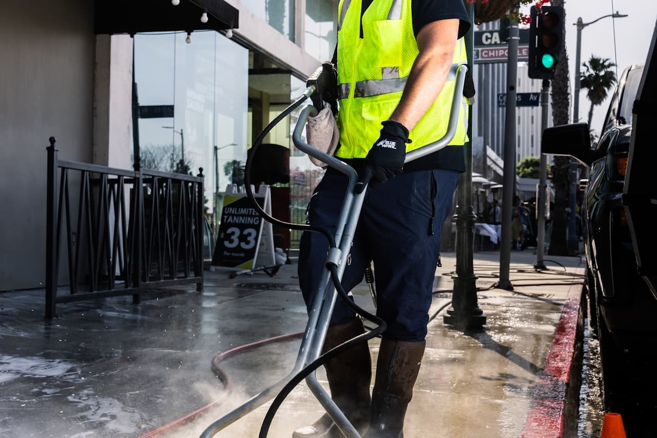 A Shineback Window Washing crew member at work